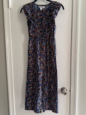 Girls Pretty Navy Floral Jumpsuit with Flutter Sleeves Size 10